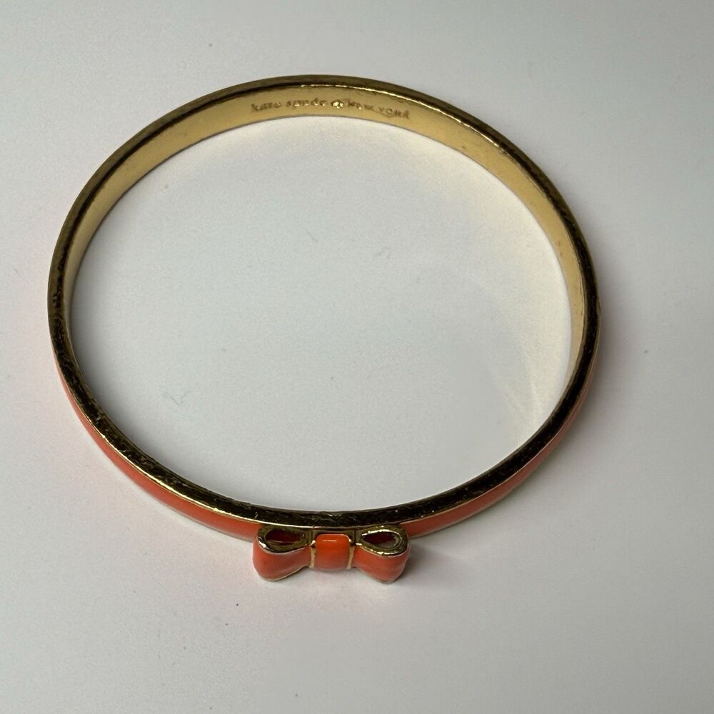 Kate Spade New York Skinny Gold And Orange Enamel Bangle Bow Bracelet - Picture 5 of 8